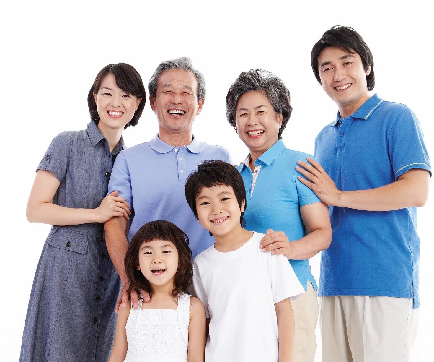 A smiling multi-generational family after their kcuts haircuts