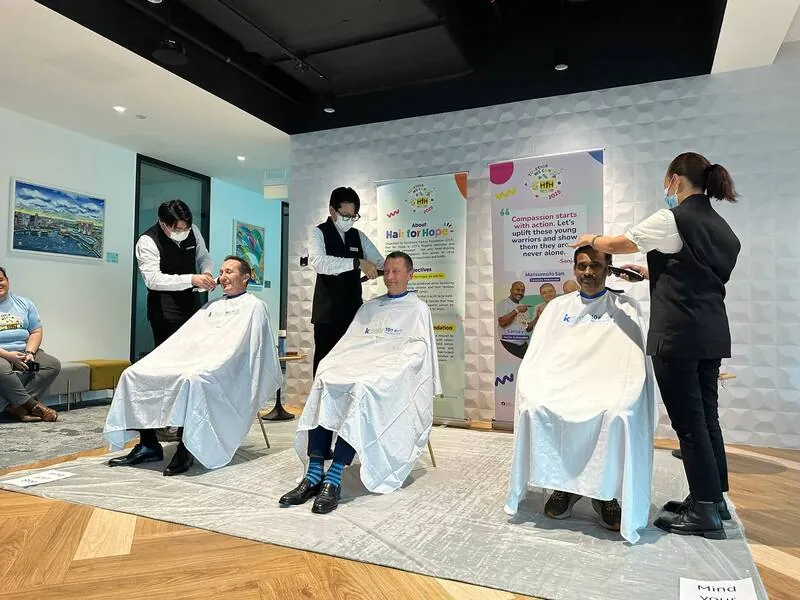 kcuts stylists shaving heads at Hair for Hope in support of children facing cancer